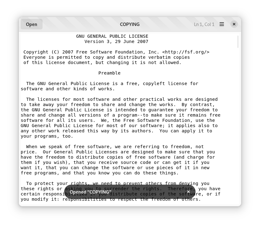 Screenshot of text-viewer in light mode with the 'COPYING' file open. A toast is visible at the bottom with the content 'Opened "COPYING"'